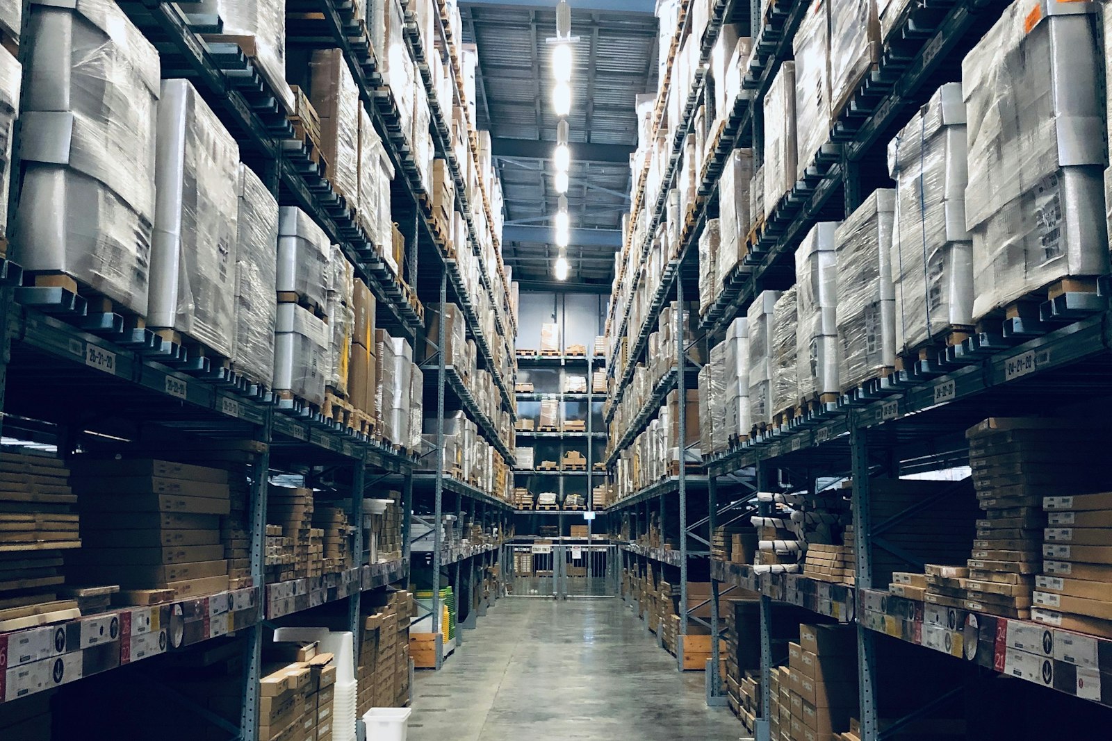 Organised warehouse aisle managed by VighnaFree Logistics